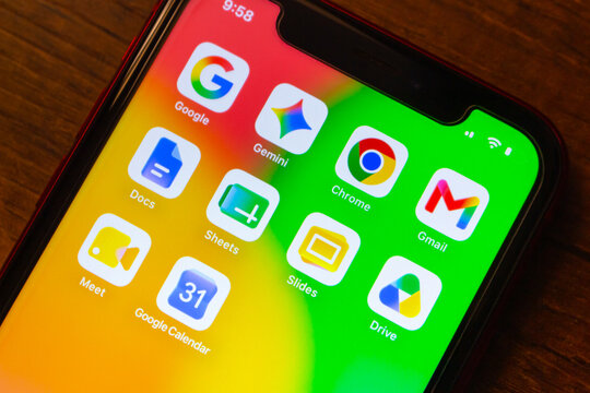 Mexico City, MEXICO - Jul 7 2026 : Google app icons, including Google Search, Gemini, Docs, Sheets, Chrome, Gmail, Meet, Google Calendar, Slides, and Drive, are seen on an iPhone home screen.
