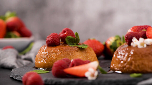 Creamy Caramel Flan Topped with Fresh Raspberries and Strawberries