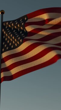 The United States American flag flies atop a skyscraper in New York