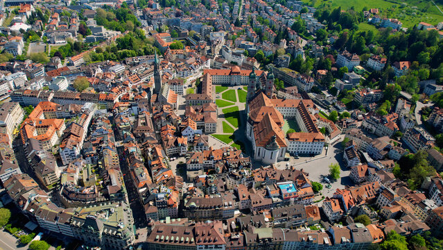Aerial panoramic view above the old town around the city St Gallen in Switzerland on a sunny summer noon. 