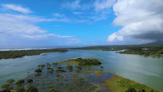 An aerial view of the river in Urunga, NSW, Australia.