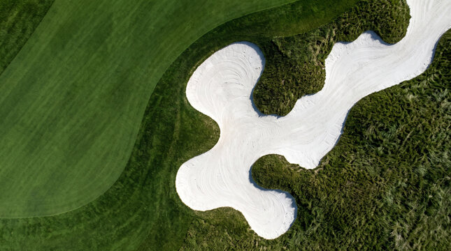 Aerial Top Down View of Golf Course Textures with Sand Bunker and Green Grass