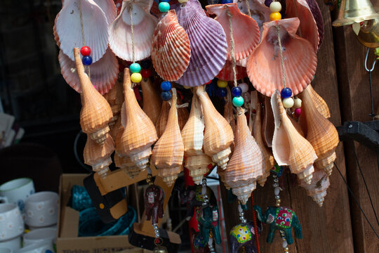 Close-up of Handcrafted Seashell Ornaments Hanging outside a Turkish Souvenir market stall, Turkey