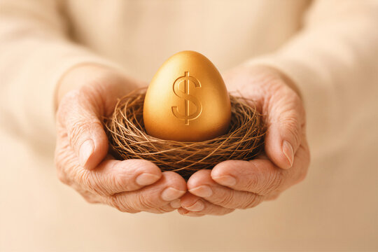 Elderly hands holding a nest with a golden egg. Conceptual image representing retirement savings, passive income, financial security, wealth protection, long-term planning and future stability