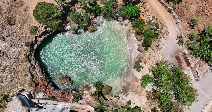 Aerial top down view of sea pool in cliffs with turquoise water  Boca de Yuma village, Altagracia, La Romana, Dominican republic