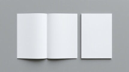 Fototapeta premium Open and closed blank brochures on grey background, top view. Mock up for design