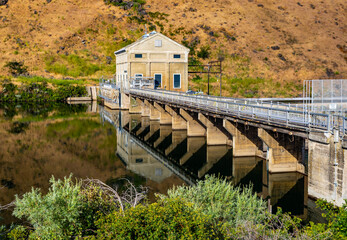 Fototapeta premium Historic Boise River Dam Reflecting in Water