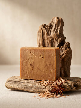 raditional sandalwood soap bar mockup on weathered driftwood &mdash; handmade natural spice soap with star anise and aromatic wood shavings on linen tablecloth