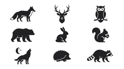 Obraz premium Black silhouettes of forest animals side view.