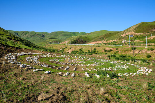 The White Stone Totem Landscape on the Grassland of Tekes, Xinjiang, China