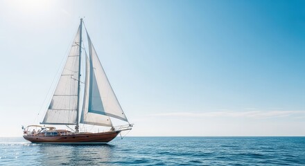 Fototapeta premium A majestic wooden sailboat glides gracefully across calm blue ocean waters under a clear sky during a bright and truly peaceful summer day, outdoors, day, tranquil