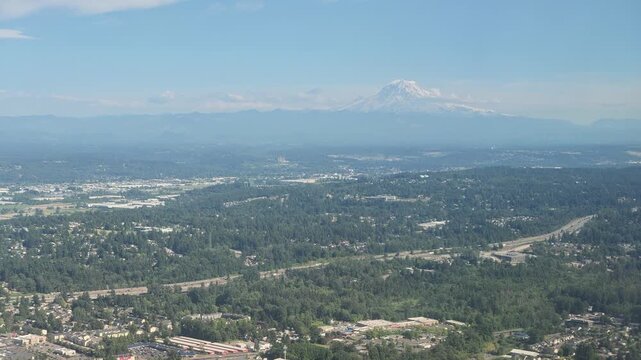 Aerial view of Mount Hood over suburban landscape in Washington state