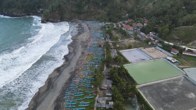 Aerial View of Fisherman's Village at Watubale Beach During Sunset, Kebumen, Indonesia