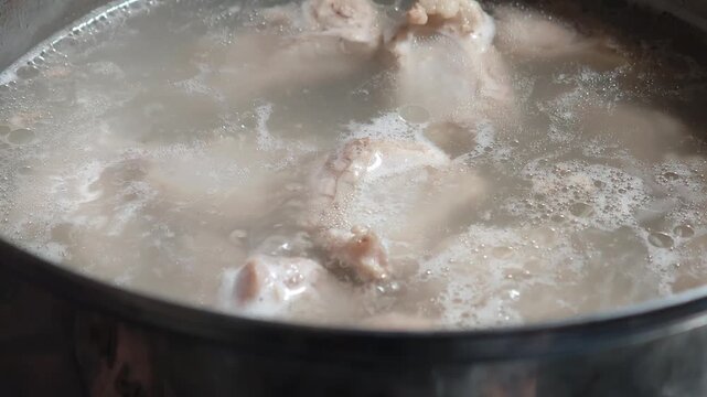 Boil bone broth in a pot.