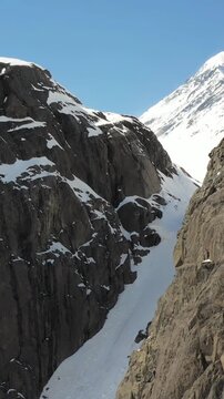 Vertical aerial video of Altai natural mountain landscape. Trough valley with Aktru glacier.