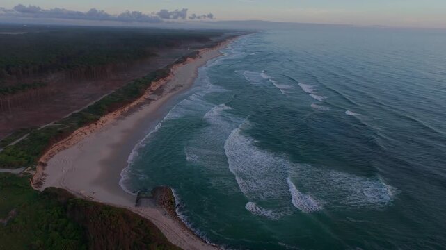 Aerial - Long Sandy Beach at Sao Pedro de Maceda in Ovar Portugal with Waves Dunes and Pine Forest