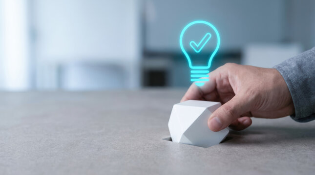 Hand placing geometric shape into hole with light bulb and check mark symbol representing customer value proposition and cvp concept