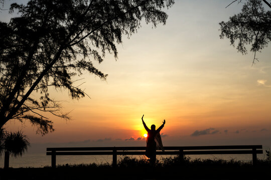 Sunrise and traveler with silhouette