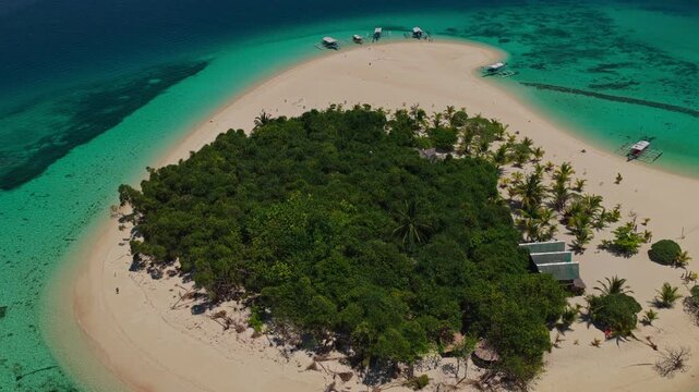 High altitude aerial rocket ascent looking straight down over Patawan Island, Balabac, Philippines. Top-down vertical drone flight climbs above tropical sandbar and reef ecosystem.