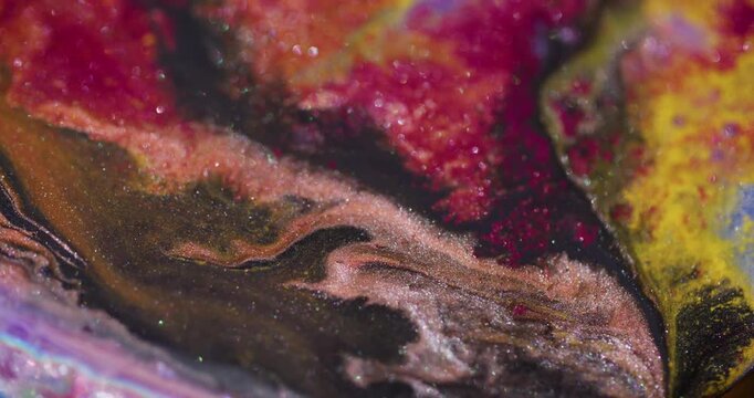 Shiny blend blur. Ink flare. Spectrum liquid stream spill on wet background. Red black yellow particles abstract colorful texture.