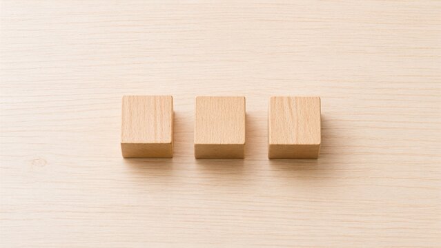 Minimalist Wooden Blocks Arranged in a Row on Light Wood Table with Copy Space, Home and Real Estate Concept