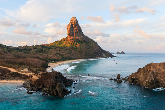 Aerial view of Morro do Pico and the turquoise bay, Fernando de Noronha, Pernambuco, Brazil