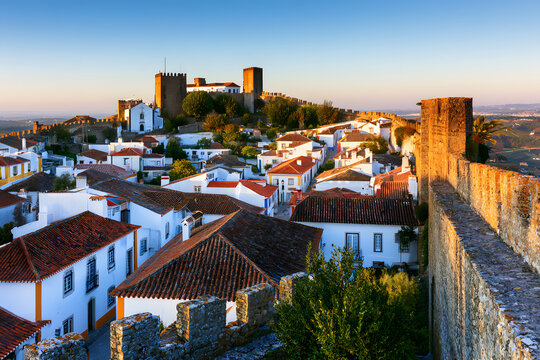 Obidos, a medieval town in Portugal, boasts castle walls and a stunning sunrise view