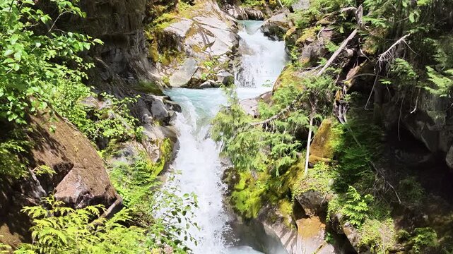 Turquoise Mountain Stream Flowing Through Rocky Canyon in Washington