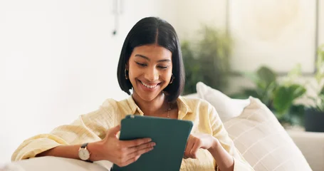 Streaming, digital or woman on couch with tablet, video subscription or post update on online site. Happy, space or person in house with tech, internet search or show binge on entertainment platform © peopleimages.com