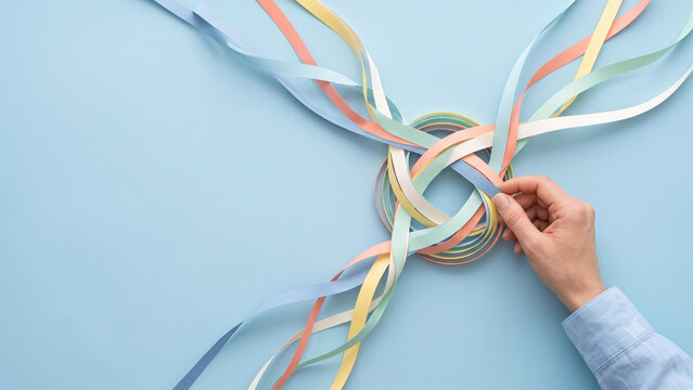 Connected Thinking Concept with Colorful Ribbons Tied in Knot