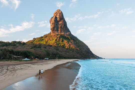 Aerial view of couple on the beach near Morro do Pico, Fernando de Noronha, Brazil