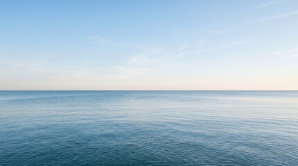 Fototapeta premium Vast Ocean Horizon Under a Clear Blue Sky.