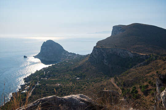 Panoramic view of Capo Zafferano rocky promontory from Monte Catalfano park in Sicily
