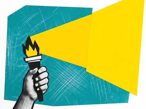 Hand holding torch with yellow light beam fire flame