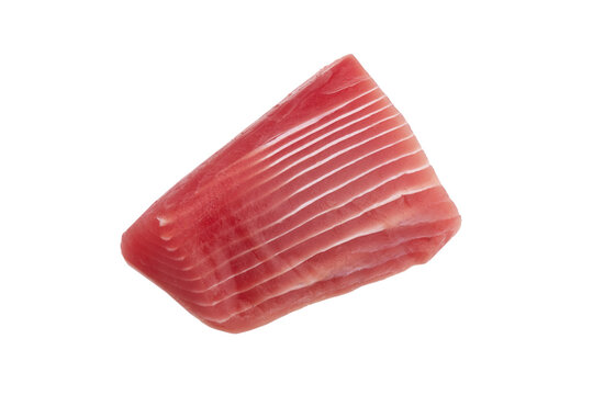 Macro shot blue fin tuna steak isolated on white background. Fresh rare steak close up. Raw bluefin tuna fillet texture. Background fresh tuna meat. Slices of tuna meat.