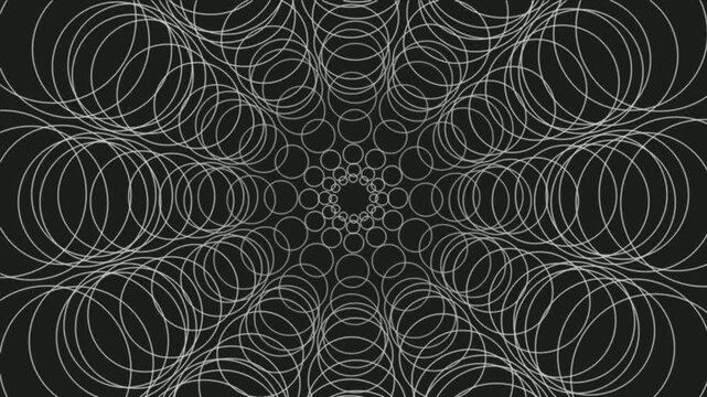 Abstract white circle pattern evolving on a black background
