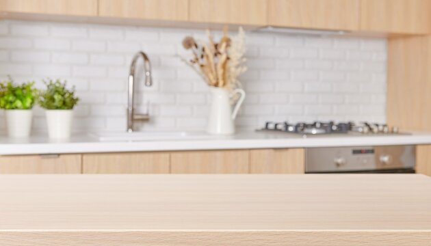 Modern kitchen interior with wooden cabinets and white subway tile backsplash.