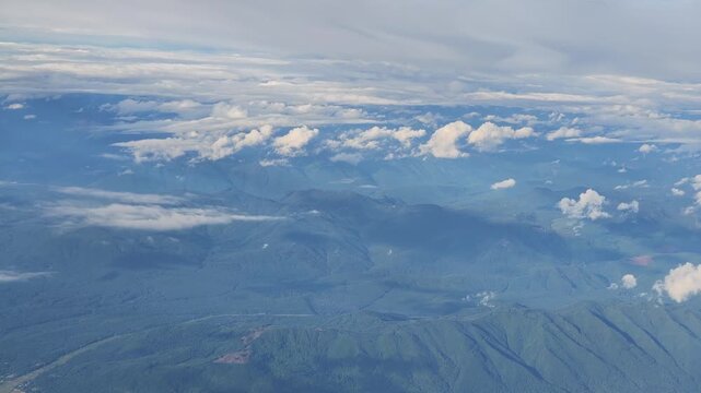 Aerial view of mountainous landscape and clouds in Washington state