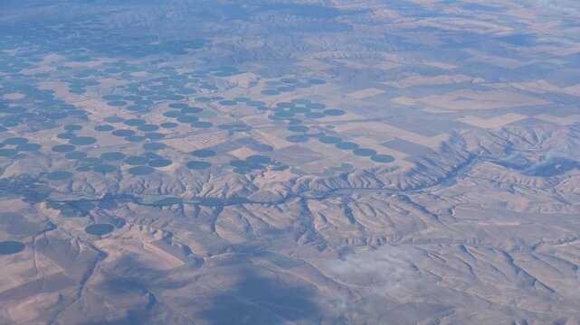 Aerial view of circular center pivot irrigation fields in Washington state