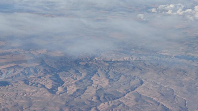 Aerial view of arid rolling hills and valleys in Washington state