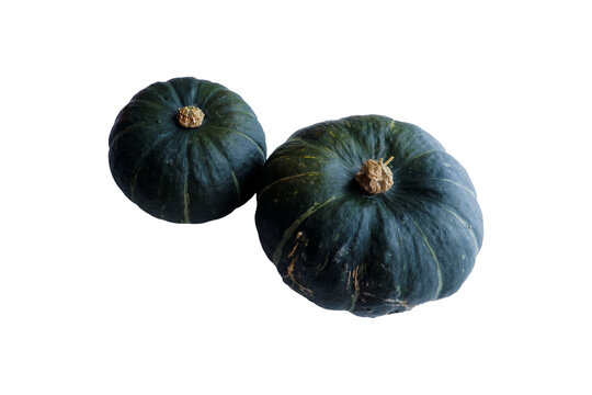 Two kabocha squash isolated on a transparent background, whole fresh Japanese pumpkins