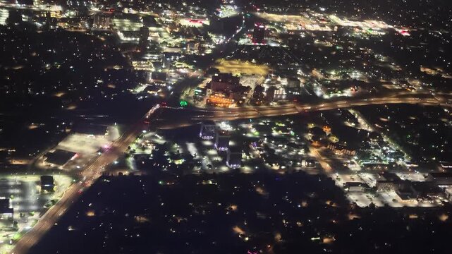 Night aerial of Oklahoma City's highways and commercial district