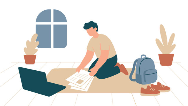 Student preparing documents on the floor with laptop and backpack planning graduation path