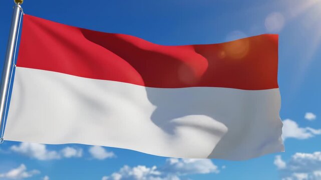 Indonesia flag waving in the blue sky, red and white horizontal bicolor, clear day with sun rays and clouds, national symbol