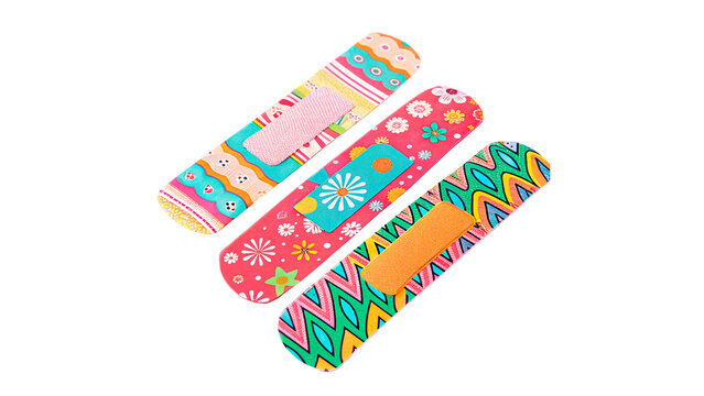 Group of colorful patterned medical plasters adhesive bandages isolated on transparent background
