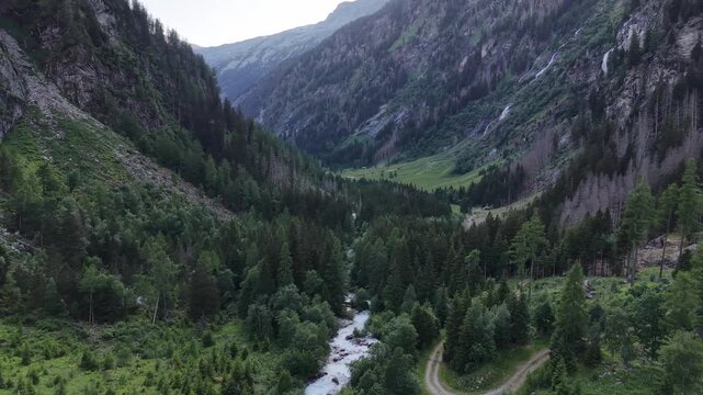Mallnitz, Austria - June 11 2026: Spectacular 4K aerial drone footage of Seebachtal (Seebach Valley) in Hohe Tauern National Park, Austria. The video showcases breathtaking alpine scenery, lush meadow