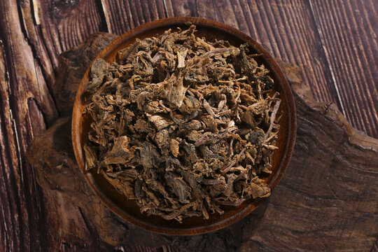Traditional Chinese Dried Xuelihong Preserved Vegetable in Wooden Bowl - Szechuan Cuisine Ingredient