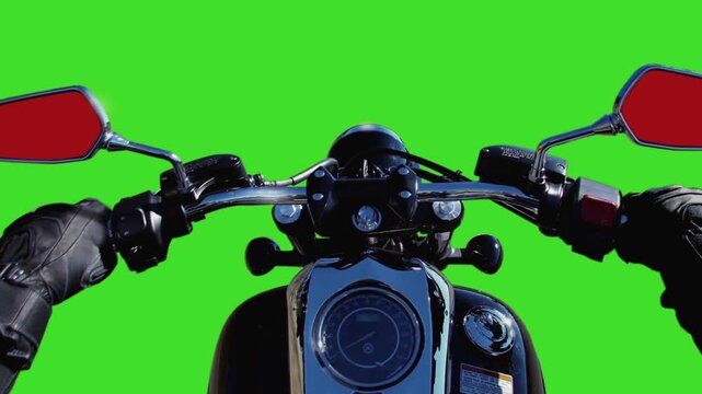 First-person perspective of a biker revving a classic chopper motorcycle with custom red mirrors on a solid green background.
