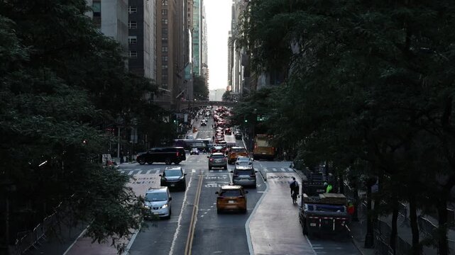 view down 42nd street in manhattan new york city skyline view (iconic skyscrapers) road cars drive sunset commercial business buildings center construction 2nd avenue travel tourism usa america famous