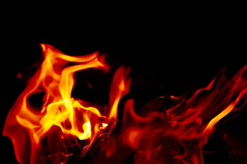 Fototapeta premium Background of the flame in the oven. Overlay layer. Tongues of fire in a fireplace.